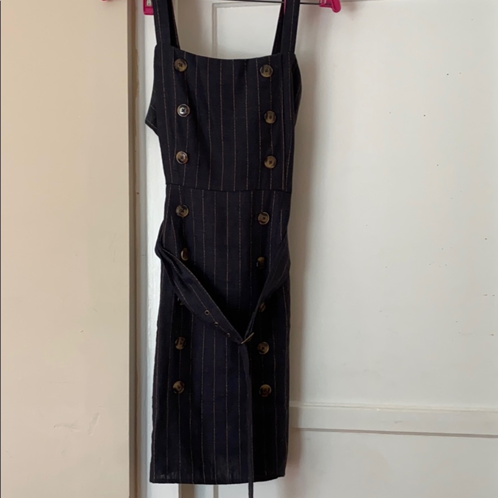 A cute little summer dress with a belt attached!